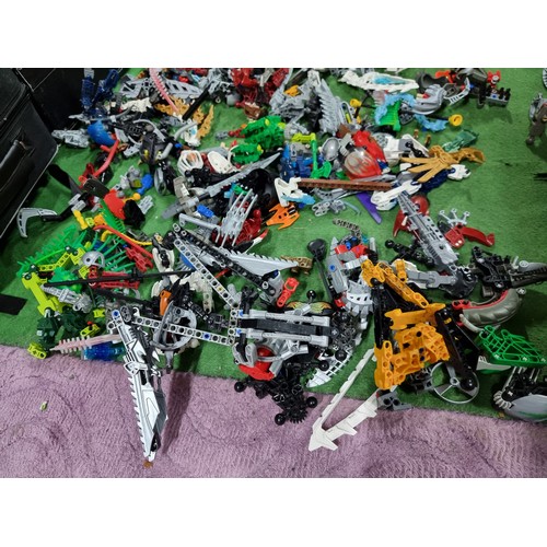 249 - A very large collection of various Lego Bionicle figures and accessories.