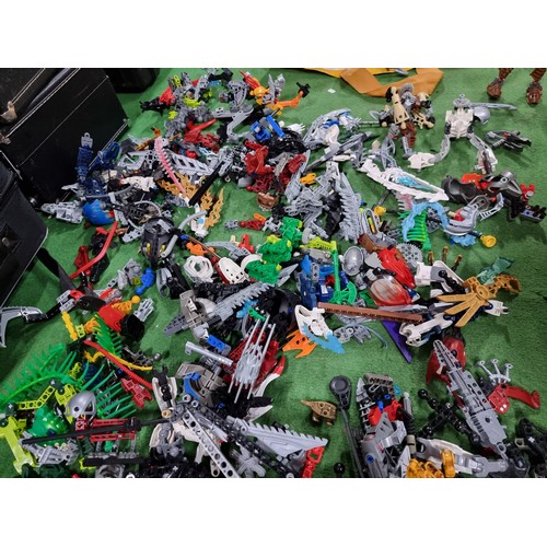 249 - A very large collection of various Lego Bionicle figures and accessories.