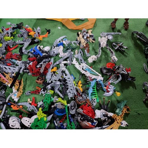 249 - A very large collection of various Lego Bionicle figures and accessories.