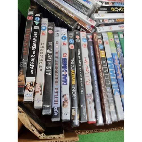 252 - A box full of various DVD's and CD's, most are new and sealed.