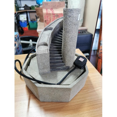 82 - Stone effect electric water fountain in the shape of a spiral fountain, height of 34cm