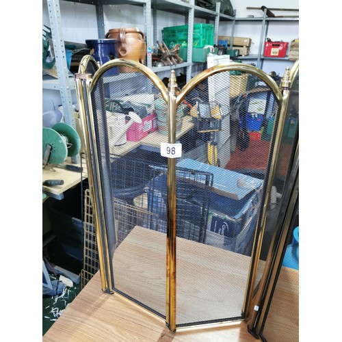 98 - Pair of concertina brass framed fire screens both in good order one with small brass finials to the ... 