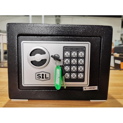 116 - Small digital combination safe with keys present in good order size 17cm high, 23cm long 17cm deep