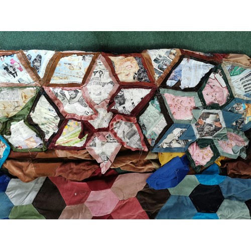 122 - Large impressive vintage patchwork quilt of various materials with newspapers sewn into the back 245... 