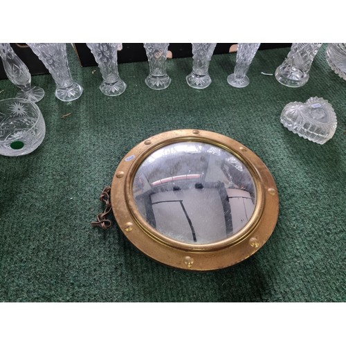 257 - 3 boxes of collectables including glassware with crystal glass, a brass porthole mirror and a box of... 