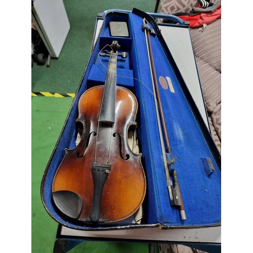 258A - Antique cased violin with a model label marked Antonius Stradivaraus, (antique copy) complete with b... 