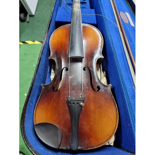 258A - Antique cased violin with a model label marked Antonius Stradivaraus, (antique copy) complete with b... 