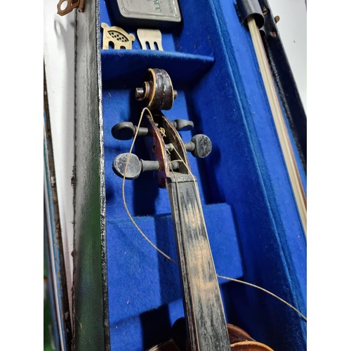 258A - Antique cased violin with a model label marked Antonius Stradivaraus, (antique copy) complete with b... 