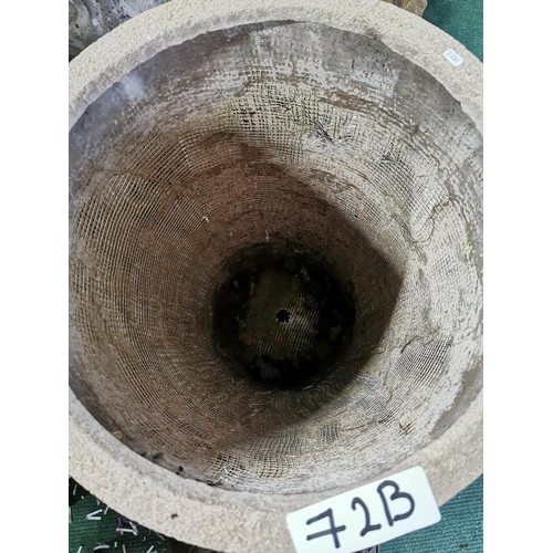 72B - Tall swirl design planter with small chip to the rim in otherwise good overall condition height 62.5... 