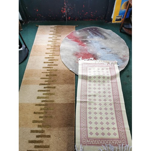 124 - Collection of 3x rugs inc a G.H.Firth oriental rug length 241cm long by 80.5cm , an oval Mondrane co... 