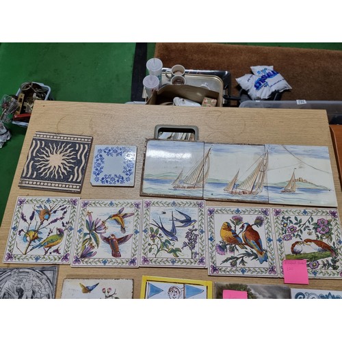 279 - 20 x Antique and vintage collectable ceramic tiles including a rare Italian tile of a boat scene att... 