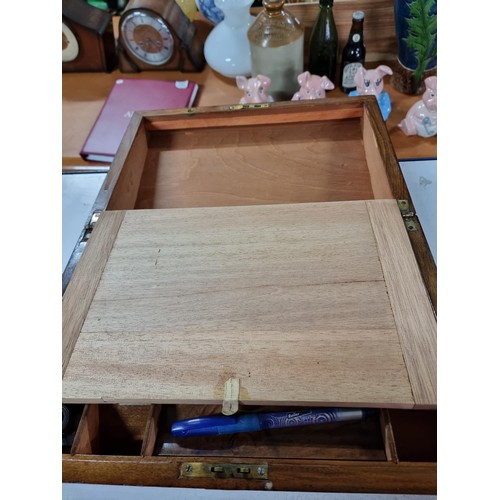 281 - Antique Mahogany writing box in good overall condition,
15cm high, 35cm length, 23cm wide