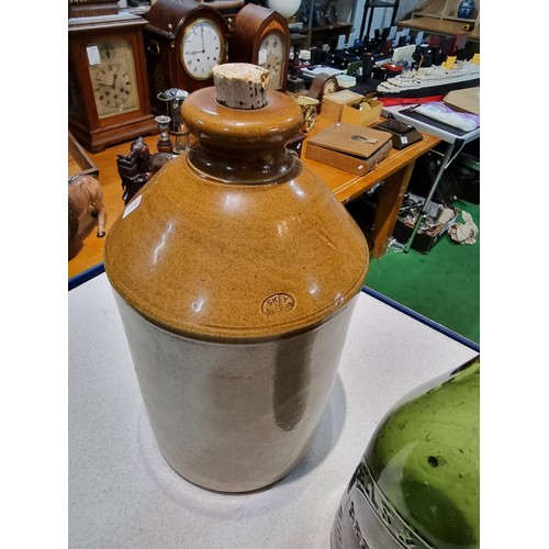 285 - Vintage stoneware flagon with advertising for Ansells brewery Birmingham along with a vintage brewer... 