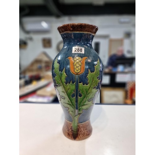 288 - Fine quality antique large glazed pottery vase with an art nouveau thistle design double sided prese... 