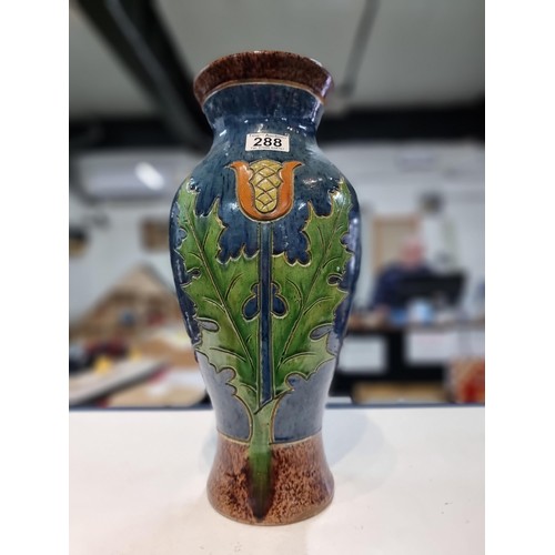 288 - Fine quality antique large glazed pottery vase with an art nouveau thistle design double sided prese... 