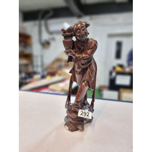 292 - Good antique solid woo carved figure of an Asian lady holding a plant, nice detail slight a/f see pi... 