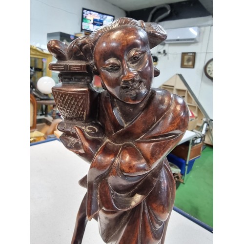 292 - Good antique solid woo carved figure of an Asian lady holding a plant, nice detail slight a/f see pi... 