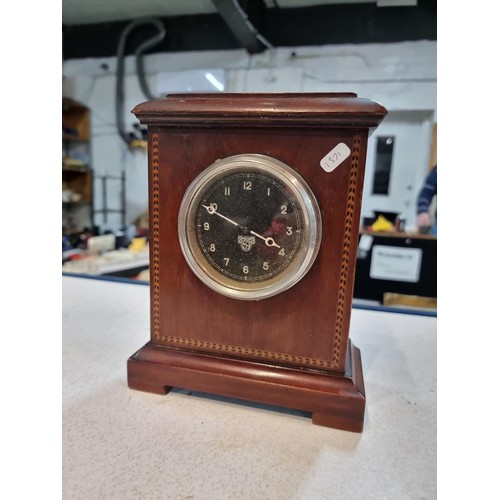 295 - Smith clock looks like from a vintage car fitted into a mahogany surround. tests as working