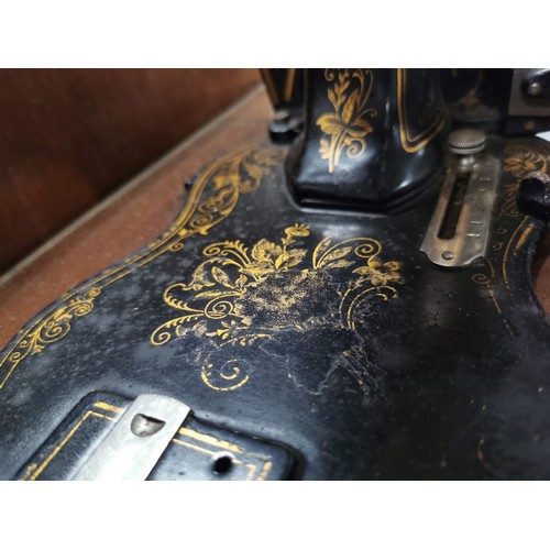 269 - Antique 1875 Singer sewing machine in excellent condition in original case along with a quantity of ... 