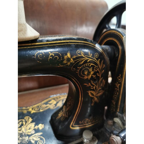 269 - Antique 1875 Singer sewing machine in excellent condition in original case along with a quantity of ... 