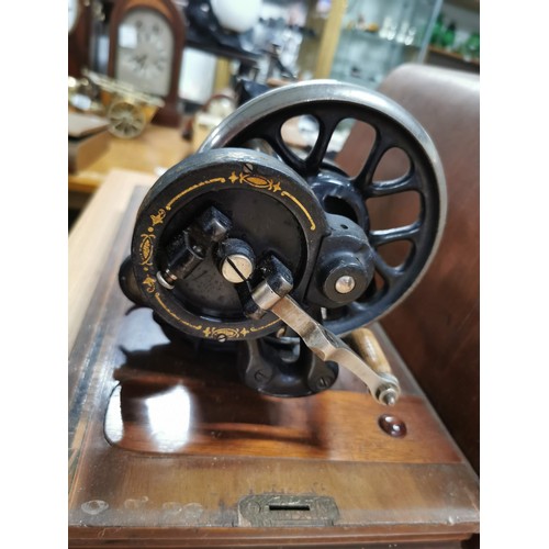 269 - Antique 1875 Singer sewing machine in excellent condition in original case along with a quantity of ... 