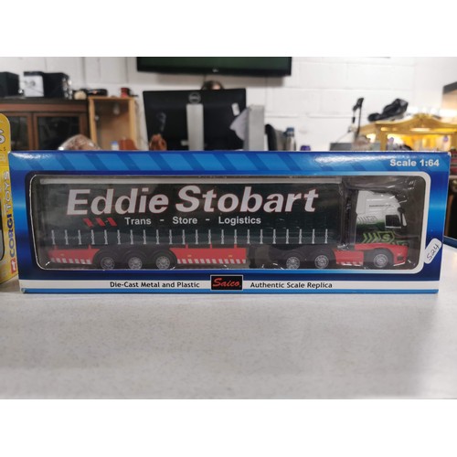 188 - 2 boxed as new Eddie Stobart diecast lorries one by Corgi toys the other by Saico. Scale 1:64