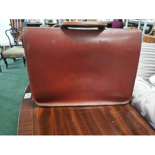 113 - Vintage metal cash box along with a good quality leather briefcase all in good order, box measures 1... 