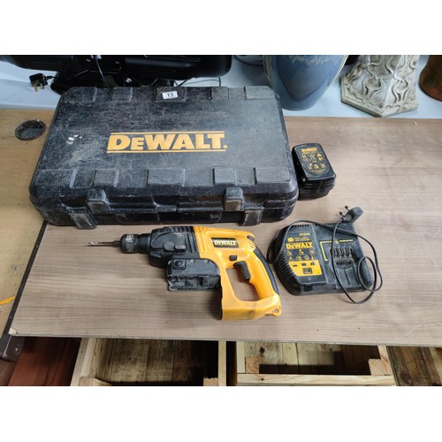 13 - A cased DeWalt heavy duty cordless hand drill, model DE0246 complete with charger and working batter... 