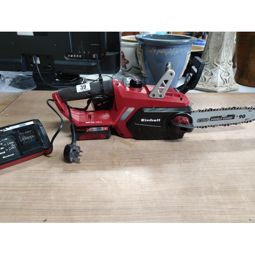 39 - An Einhell cordless chainsaw model GE-LC18LI complete with spare chain and charger in full working o... 