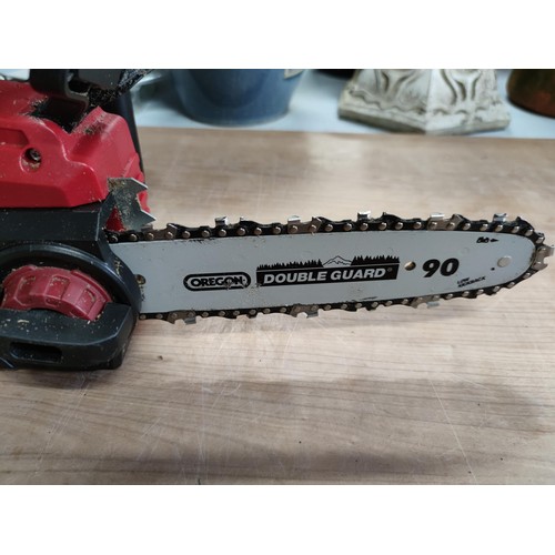 39 - An Einhell cordless chainsaw model GE-LC18LI complete with spare chain and charger in full working o... 