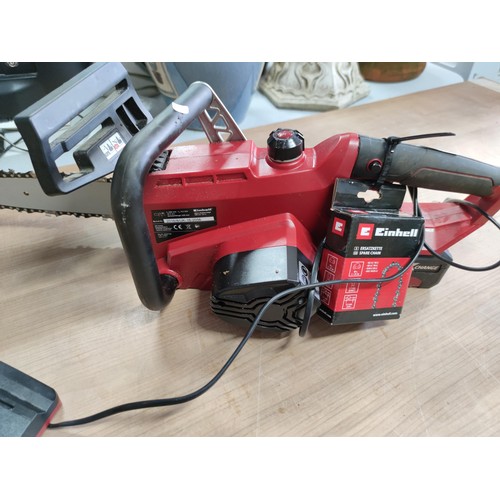 39 - An Einhell cordless chainsaw model GE-LC18LI complete with spare chain and charger in full working o... 