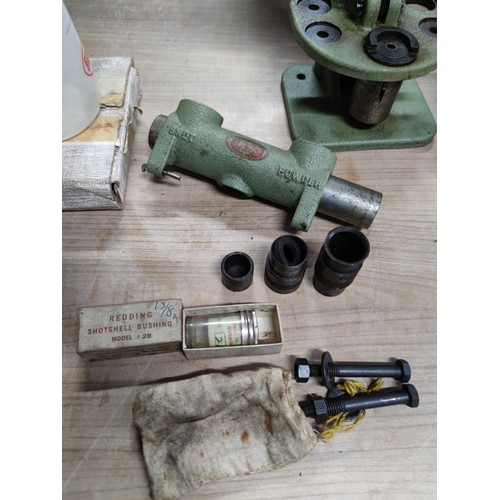 43 - A Redding 12 bore shotgun reloading press complete with Redding shot powder bottles, shot shell brus... 