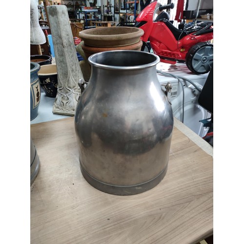 53 - A Rostfritt Stal Swedish milk churn, plus one other unbranded. Both stainless steel. Swedish churn h... 