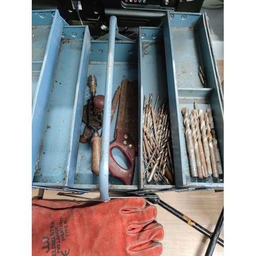 63 - A cantilever tool box containing a quantity of drill bits with a  hand drill, along with a cast iron... 