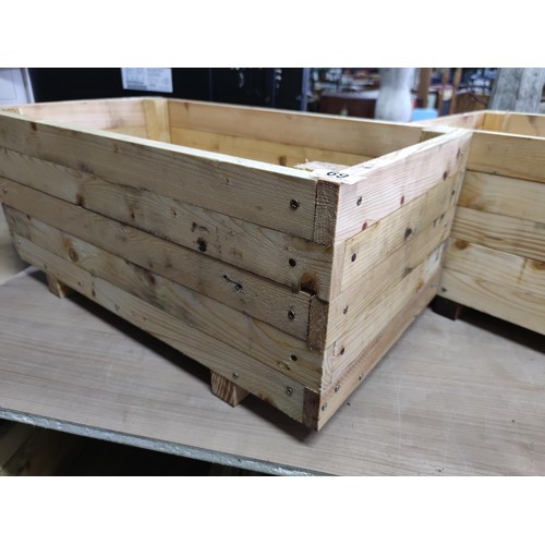 69 - A pair of locally made recycled timber heavy duty planters treated with linseed oil, in very good co... 