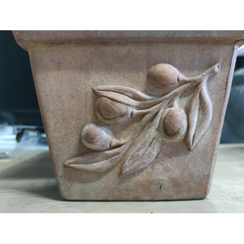 78 - A vintage terracotta planter with a quince decoration design along with a hexagonal shaped terracott... 