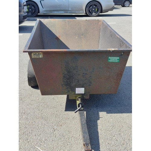 92 - A steel lawnmower/quad tipping trailer with a spring loaded quick release for tip, with lock pin con... 