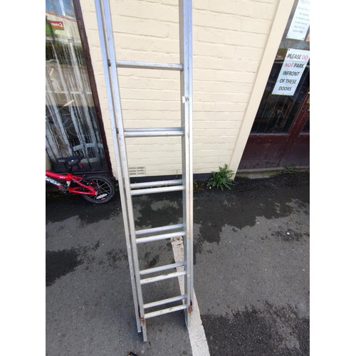 99 - A large 23ft aluminium ladder in 11.5ft length.