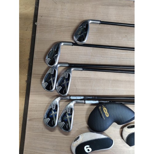 121 - A set of 6 irons by Callaway including 3,4,5,6,8 and 9. Complete with 5 socks, graphite shafts and o... 