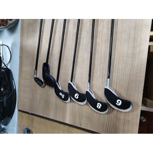 121 - A set of 6 irons by Callaway including 3,4,5,6,8 and 9. Complete with 5 socks, graphite shafts and o... 