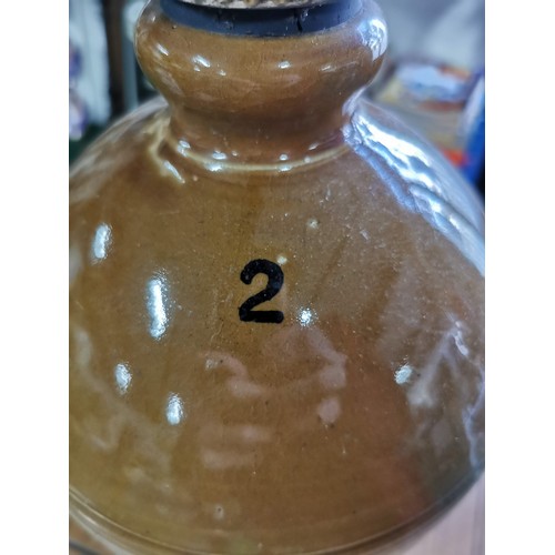 188 - Large stoneware flagon with original stopper but missing its tap
Stands 40cm high and diameter of 22... 