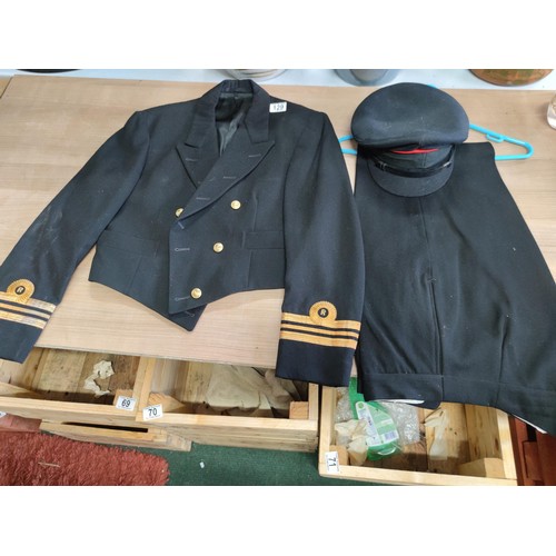 129 - Lieutenant commanders naval jacket by Paisleys Glasgow with original naval buttons along with a pair... 