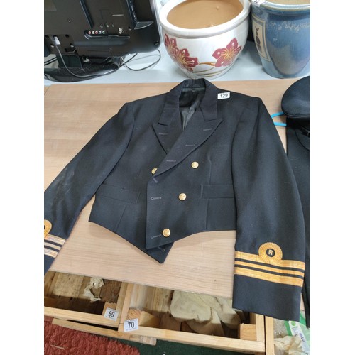 129 - Lieutenant commanders naval jacket by Paisleys Glasgow with original naval buttons along with a pair... 