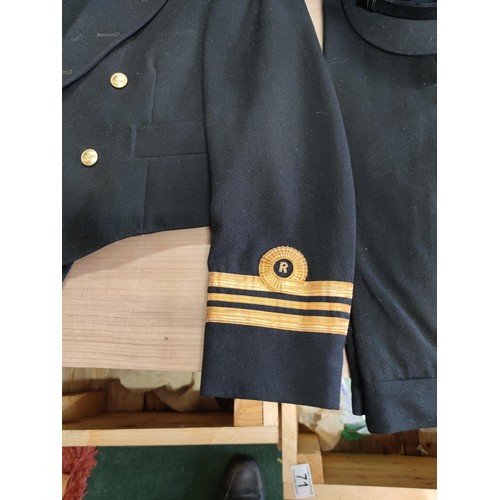 129 - Lieutenant commanders naval jacket by Paisleys Glasgow with original naval buttons along with a pair... 