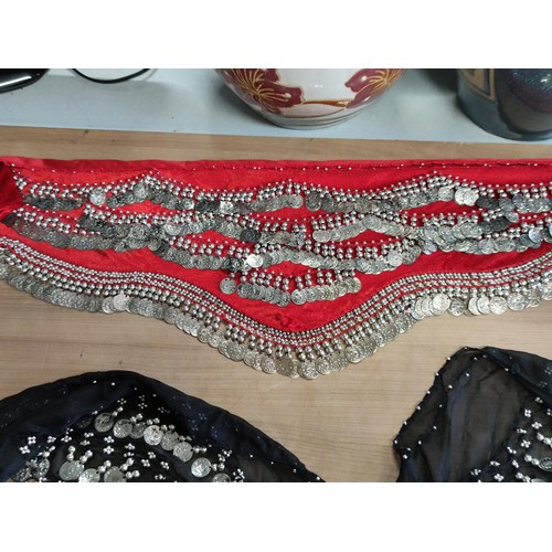 135 - 3 belly dancer hip scarves, one in red velvet, one in satin and one with sequins. All in good order.