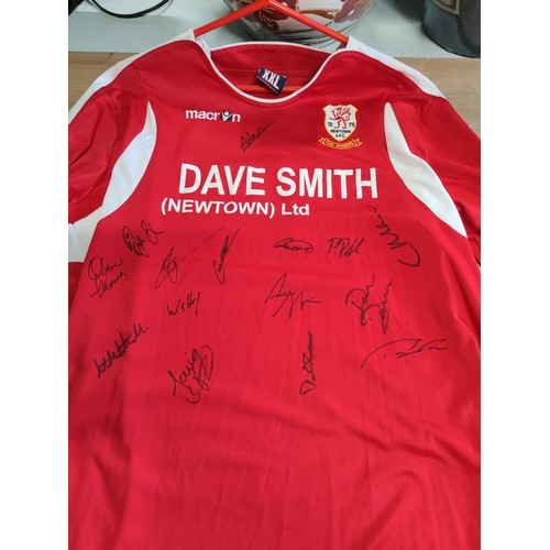 142 - A genuine Rare one off Newtown AFC football long-sleeve shirt size fits 16yr, old boy, signed by all... 