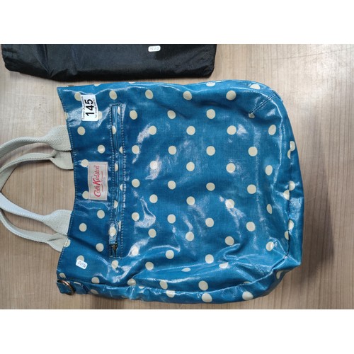 145 - An original Cath Kidston shoulder bag in polka dot blue along with a dune london beige and gold colo... 