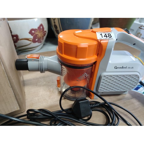 148 - A new in box groundlevel HO-HVAC600 hand cyclone vacuum vacuum with accessories.