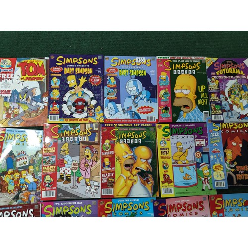 163 - A collection of 32 The Simpsons comics, made by Bongo comics group, all dating to the early 2000's, ... 