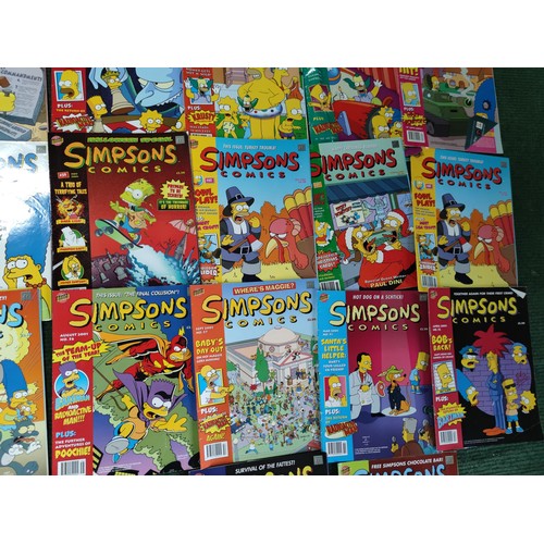 163 - A collection of 32 The Simpsons comics, made by Bongo comics group, all dating to the early 2000's, ... 